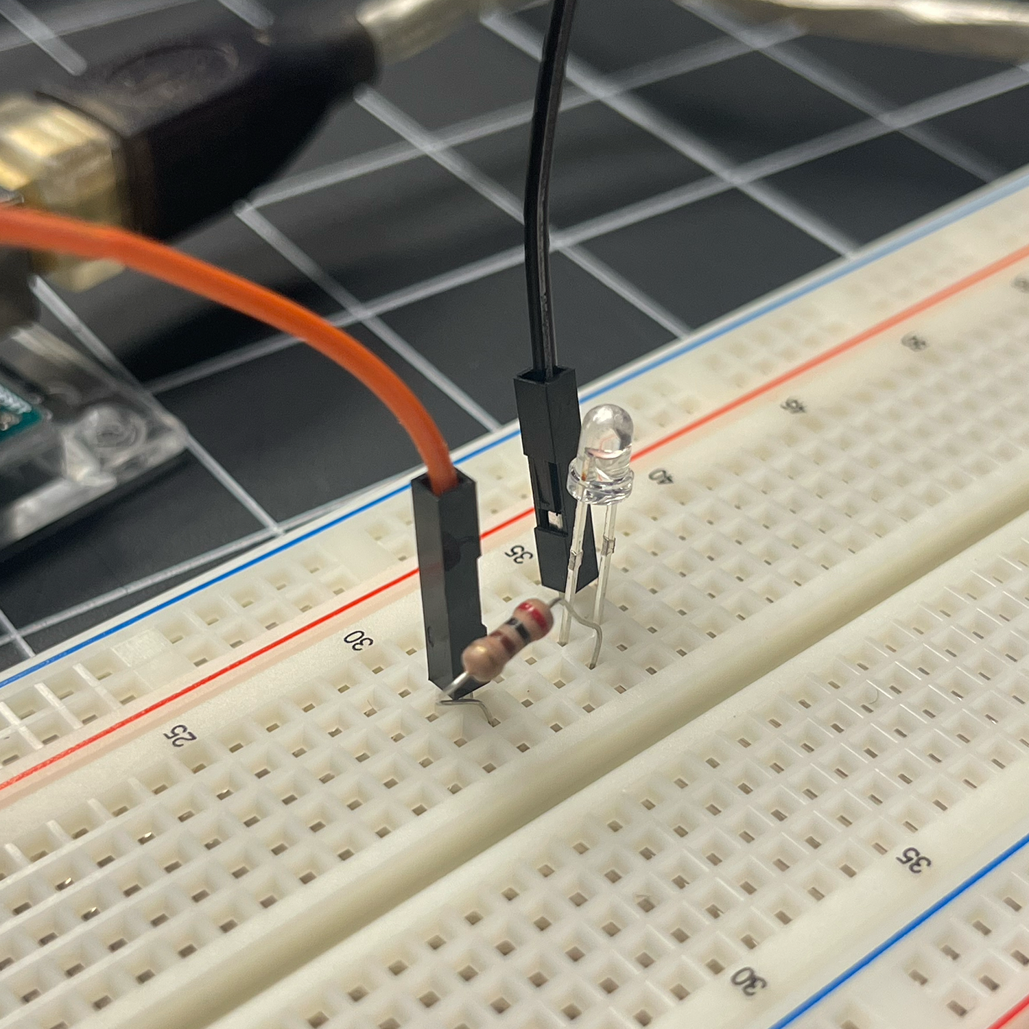 After the first circut we added a resistor to our circut. The resistor is there to prevent the LED from burning out quicker.