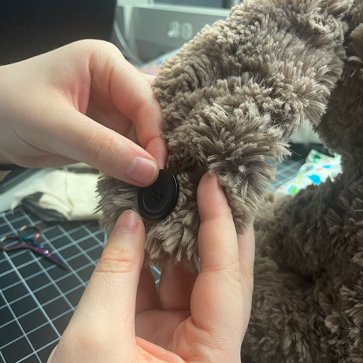 Sewing buttons on the cut pieces of fabric was something Nicole and I explored. The thought process was that sewing buttons on the fabric would allow us to make inner ciruit modifications without having to resew it.